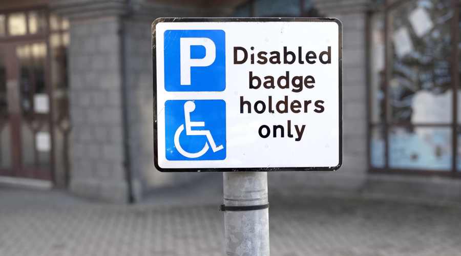 A disabled badge holders only sign