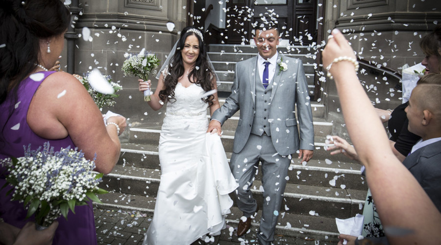 A happy couple on the Register Office steps