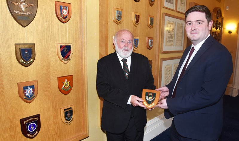 Durham Light Infantry veteran Terry Gilbert presents a DLI regimental plaque to Middlesbrough Mayor Chris Cooke for display in the Town Hall