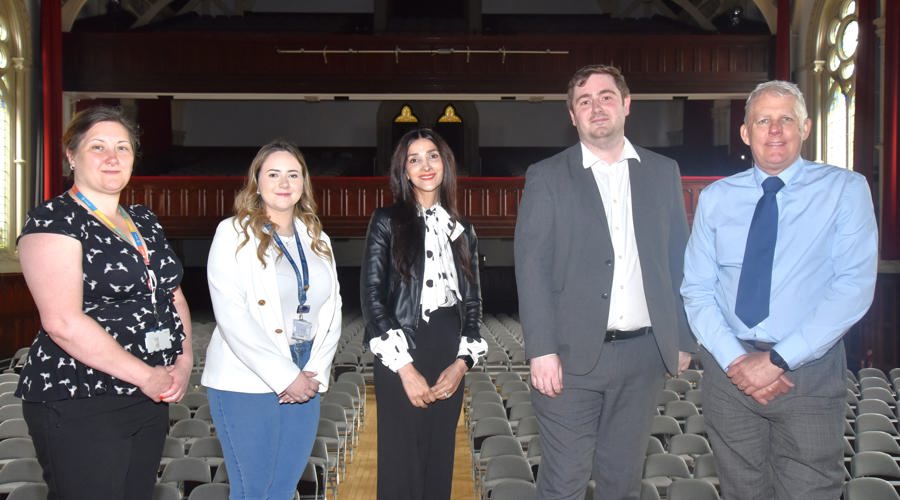 Deputy Mayor Philippa Storey, Charis Freer from Holiday Inn Express, Saliah Hameed from Teesside University, Middlesbrough Mayor Chris Cooke and Colin Newbury from Stagecoach North East on stage in Middlesbrough Town Hall